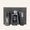A men's fragrance gift set by AFNAN, featuring a black spray bottle, a cylindrical deodorant or body spray canister, and a shower gel tube, arranged in front of a black rectangular box on a light beige background.