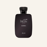 A dark brown rectangular perfume bottle with rounded corners, featuring white Arabic and English text that reads 'NAWAS For Men' and 'KOBRA'. The bottle is topped with a textured black cap and is centered against a solid off-white background.