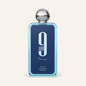 Afnan 9AM Dive EDP 100ml bottle on cream background