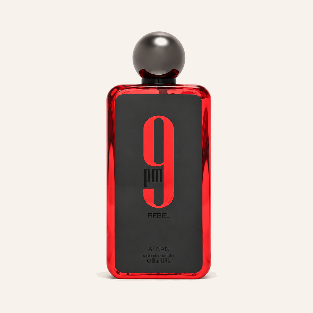 Afnan 9PM Rebel EDP 100ml bottle on cream background