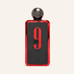 Afnan 9PM Rebel EDP 100ml bottle on cream background