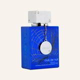 CLUB DE NUIT ICONIC 105ML on cream background
