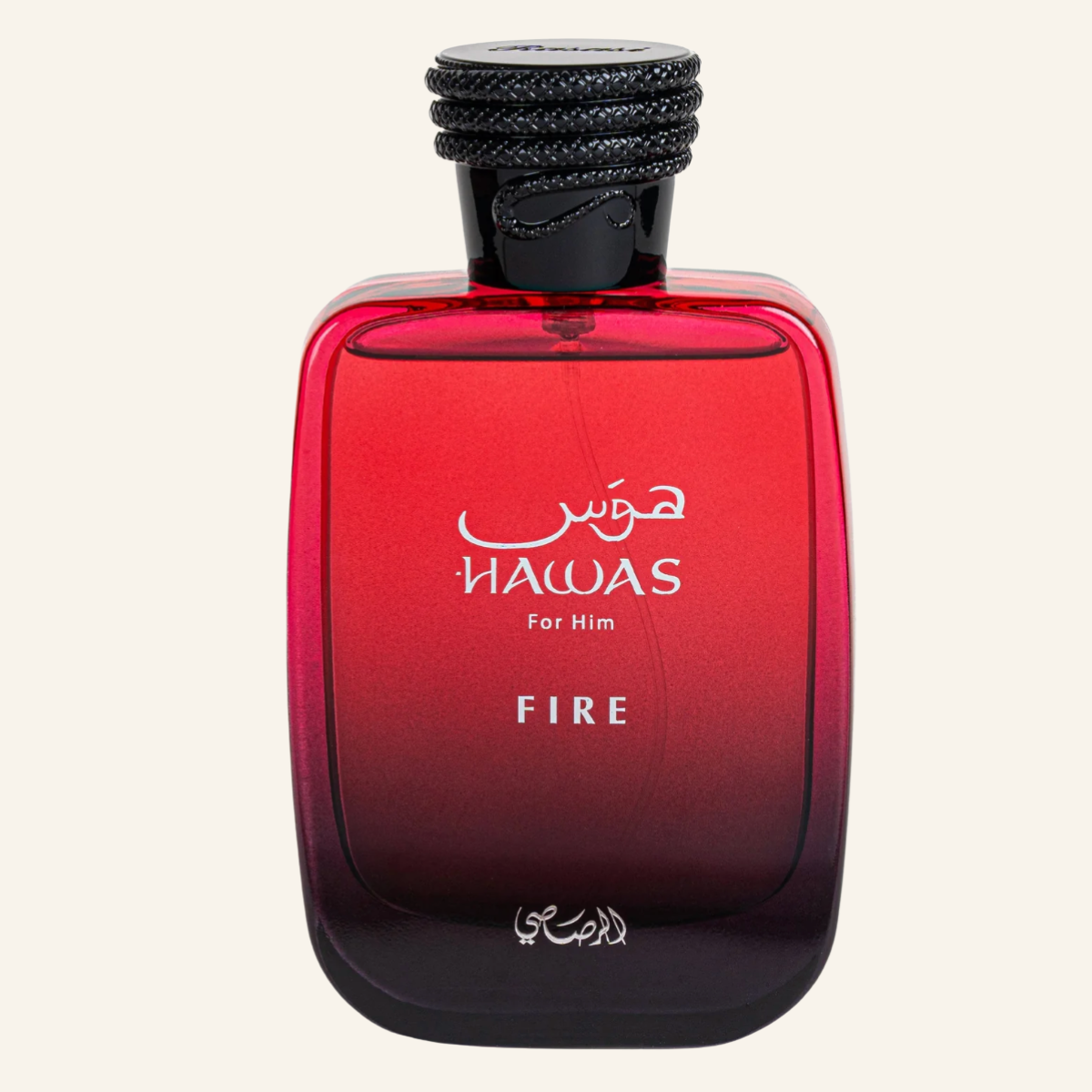 A bottle of Hawas Fire fragrance for men, featuring a translucent red-to-black gradient glass bottle with a black textured cap, set against a solid off-white background.