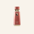 A faceted metallic rose gold perfume bottle with gold lettering that reads 'LIQUID BIRUN' and 'LIMITED EDITION' on a light cream background.