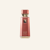 A faceted metallic rose gold perfume bottle with gold lettering that reads 'LIQUID BIRUN' and 'LIMITED EDITION' on a light cream background.