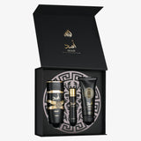 Front view of the Lattafa Asad 3-piece gift set showing the box, perfume, travel spray and shower gel